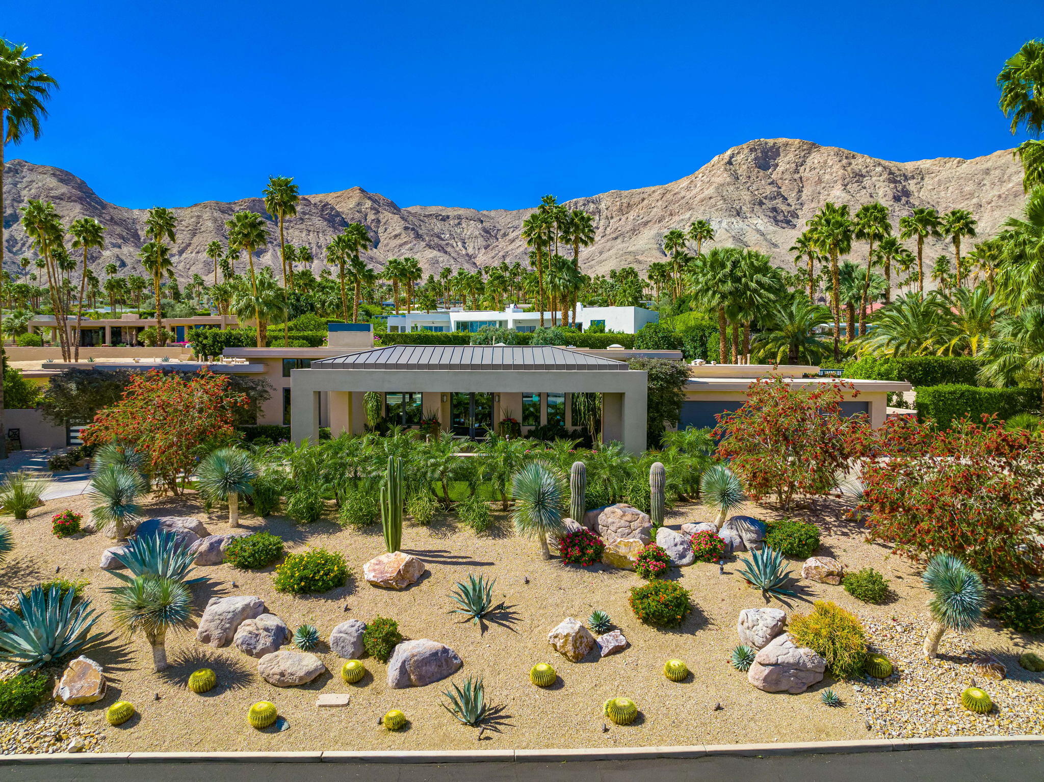 70345 Placerville Road Rancho Mirage, CA 92270 - Photo 11 of 116 a view of a house with a yard and sitting area