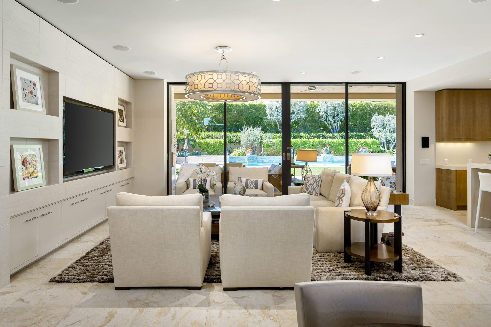 70345 Placerville Road Rancho Mirage, CA 92270 - Photo 20 of 116 a living room with furniture a flat screen tv and a large window