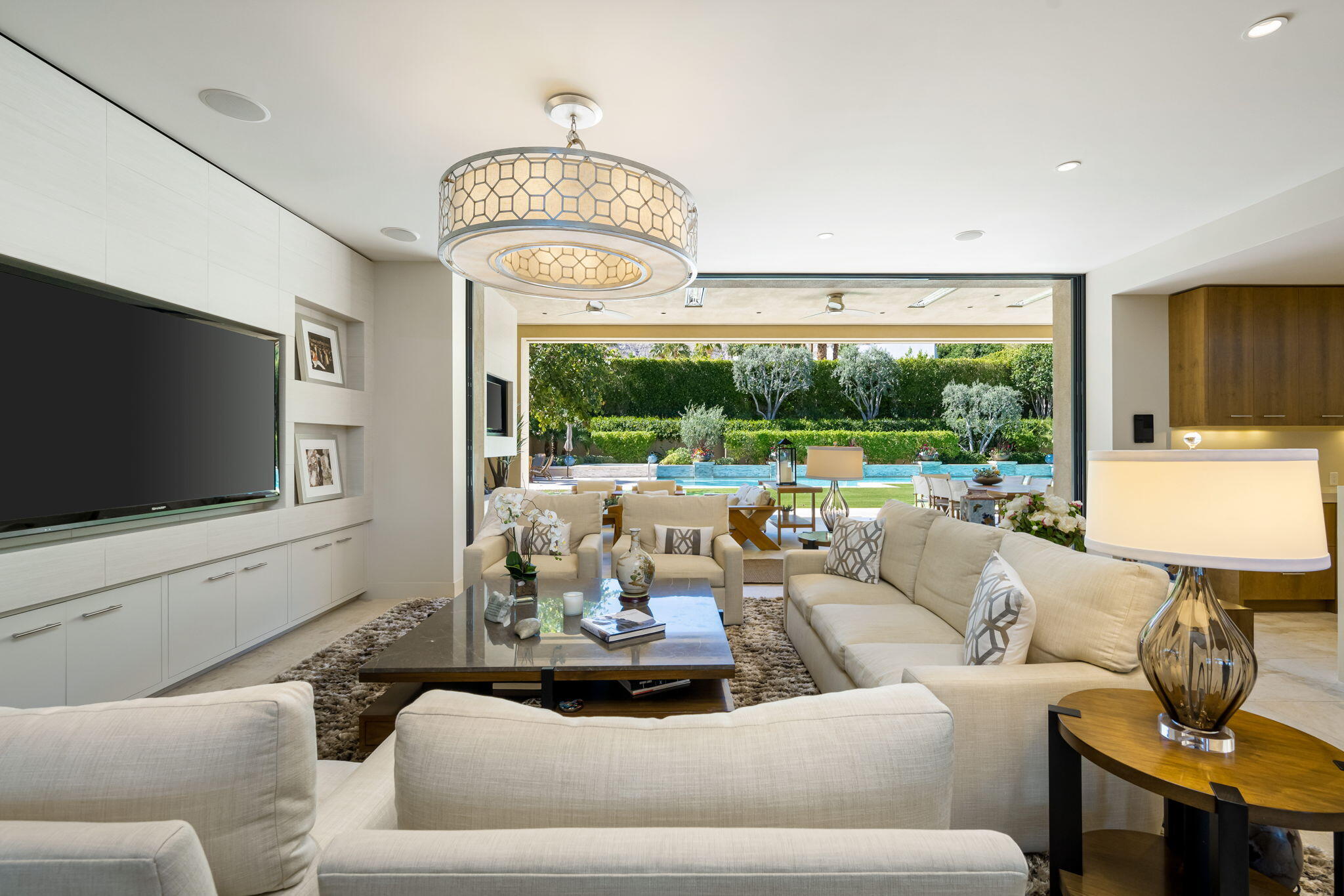 70345 Placerville Road Rancho Mirage, CA 92270 - Photo 23 of 116 a living room with furniture fireplace and a flat screen tv