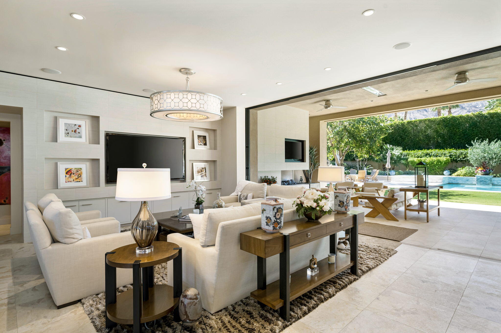 70345 Placerville Road Rancho Mirage, CA 92270 - Photo 24 of 116 a living room with patio furniture and a large window