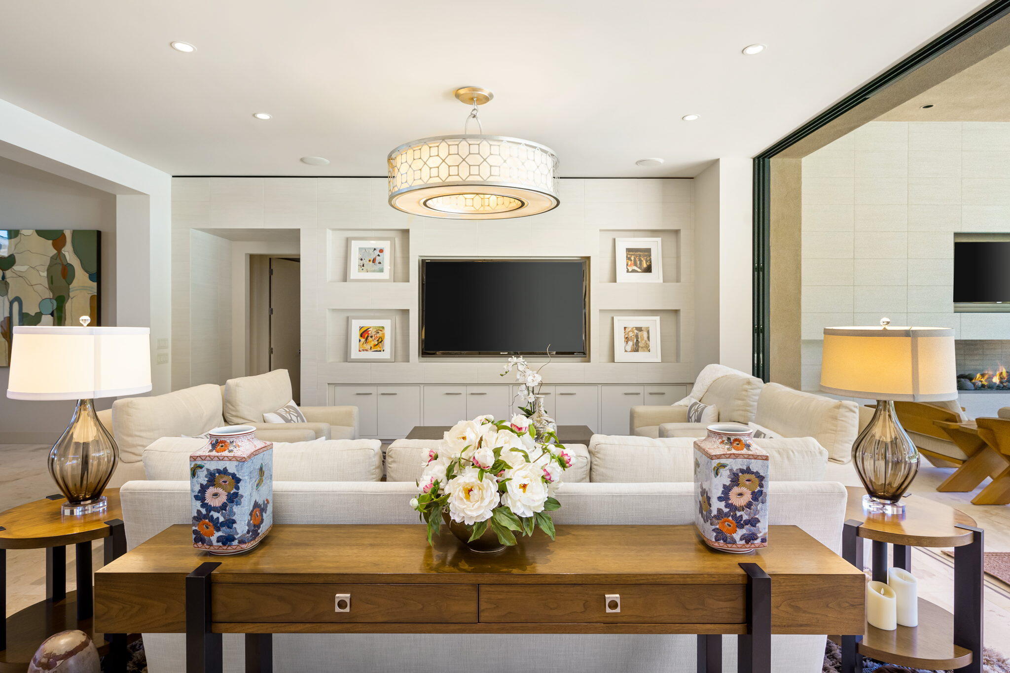 70345 Placerville Road Rancho Mirage, CA 92270 - Photo 25 of 116 a living room with furniture chandelier and a flat screen tv