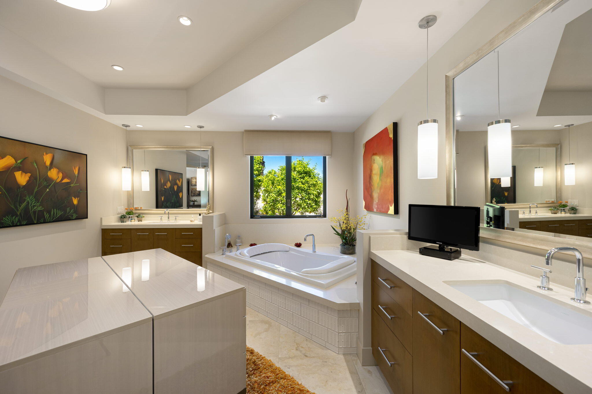 70345 Placerville Road Rancho Mirage, CA 92270 - Photo 52 of 116 a large white kitchen with a large window