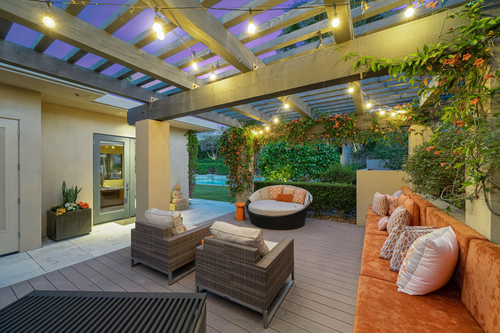 70345 Placerville Road Rancho Mirage, CA 92270 - Photo 54 of 116 a outdoor space with patio fireplace and potted plants