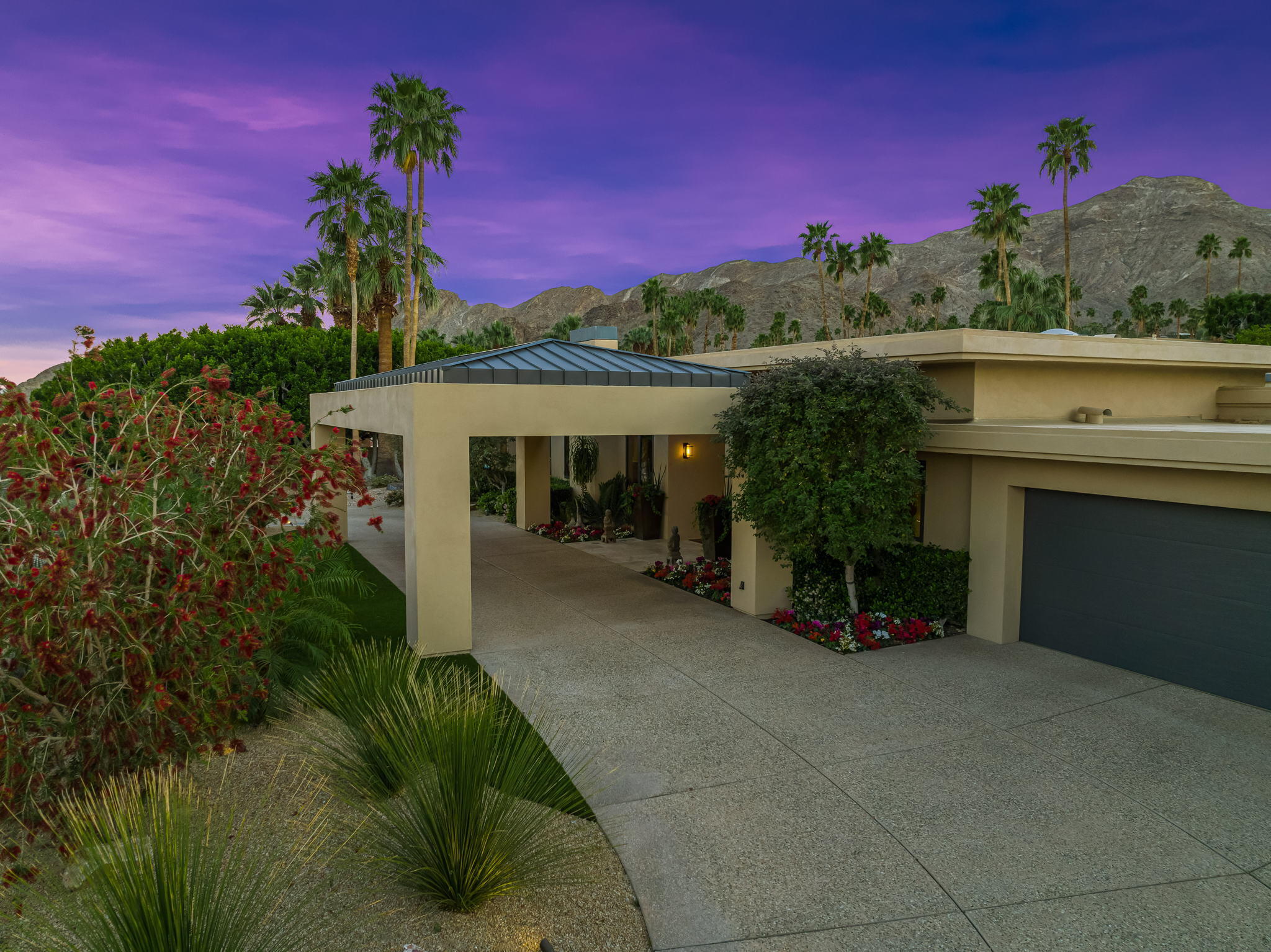 70345 Placerville Road Rancho Mirage, CA 92270 - Photo 71 of 116 a front view of a house with a yard and garage