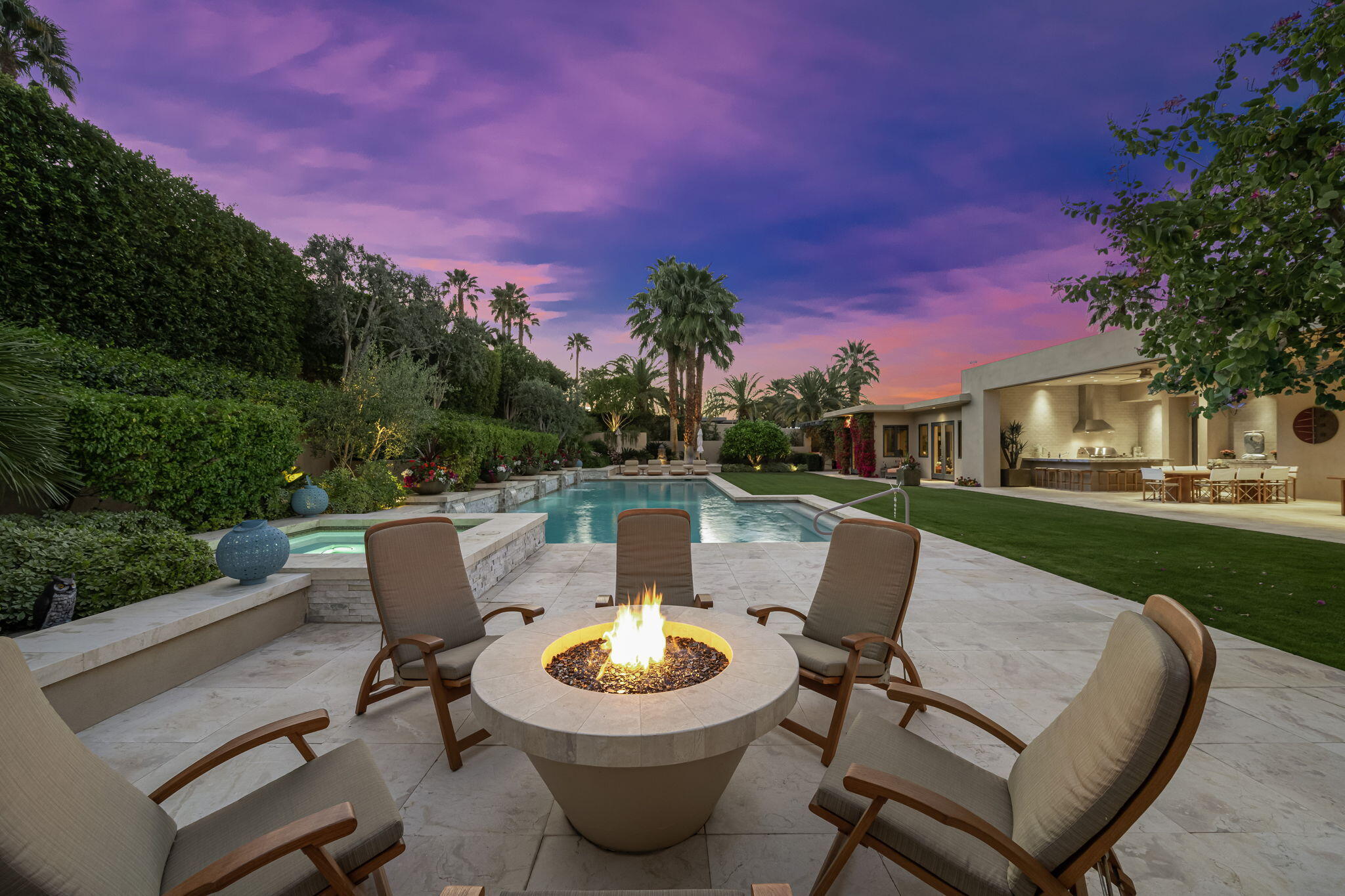 70345 Placerville Road Rancho Mirage, CA 92270 - Photo 75 of 116 a view of a patio with table and chairs and a fire pit