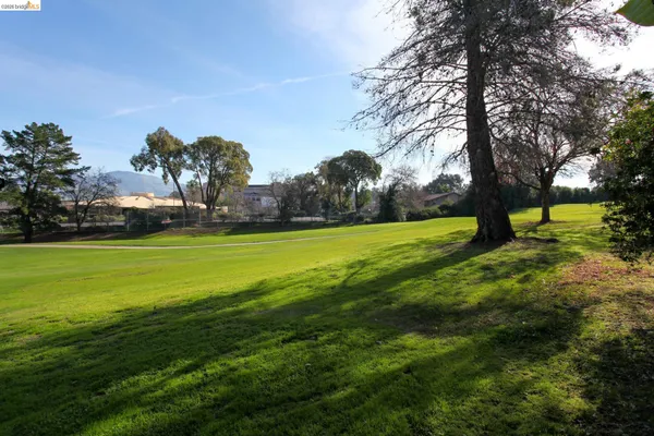 a view of a city street from a building