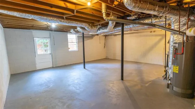 a view of a room with wooden walls