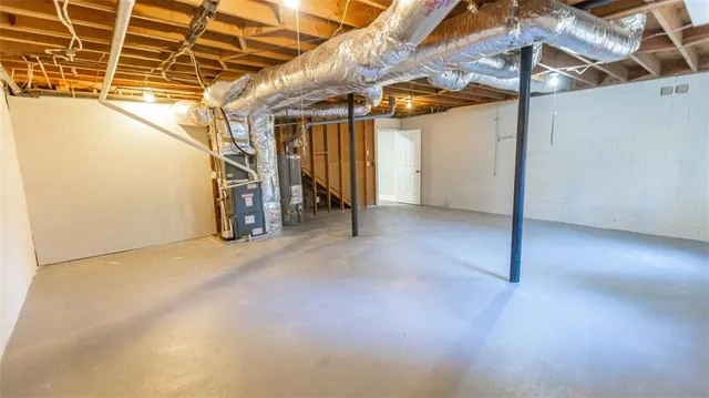 a view of a room with wooden walls