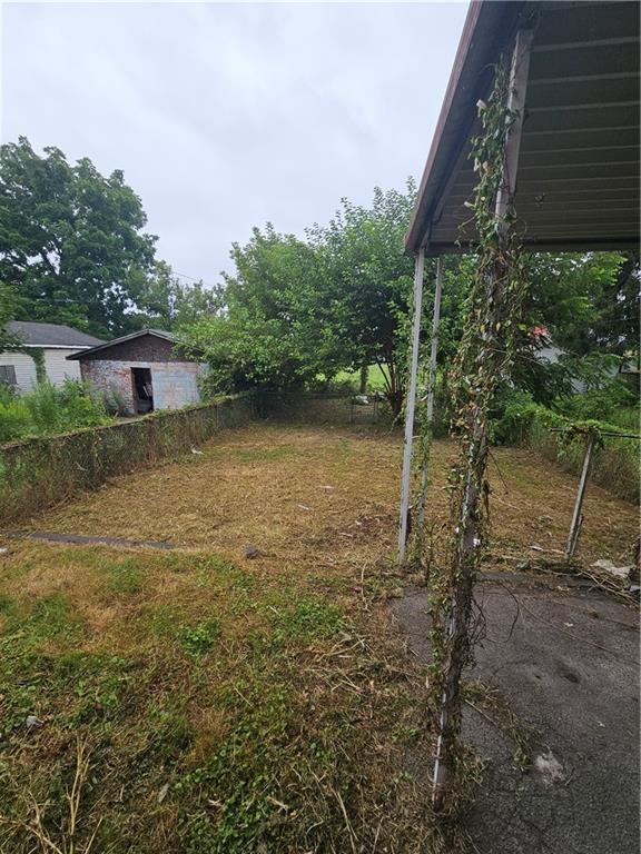 413 Electric Street New Castle, PA 16101 - Photo 2 of 23 a view of a house with a yard