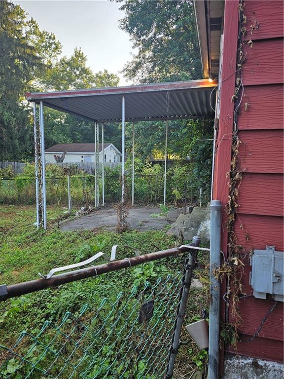413 Electric Street New Castle, PA 16101 - Photo 4 of 23 a view of a backyard with a garden