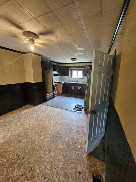 413 Electric Street New Castle, PA 16101 - Photo 10 of 23 a view of a hallway with wooden floor and staircase