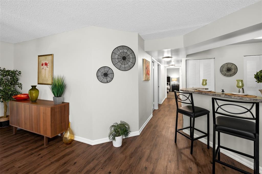10101 Southwest 14th Street, Unit 3B10108 Pembroke Pines, FL 33025 - Photo 15 of 48 a living room with furniture and wooden floor