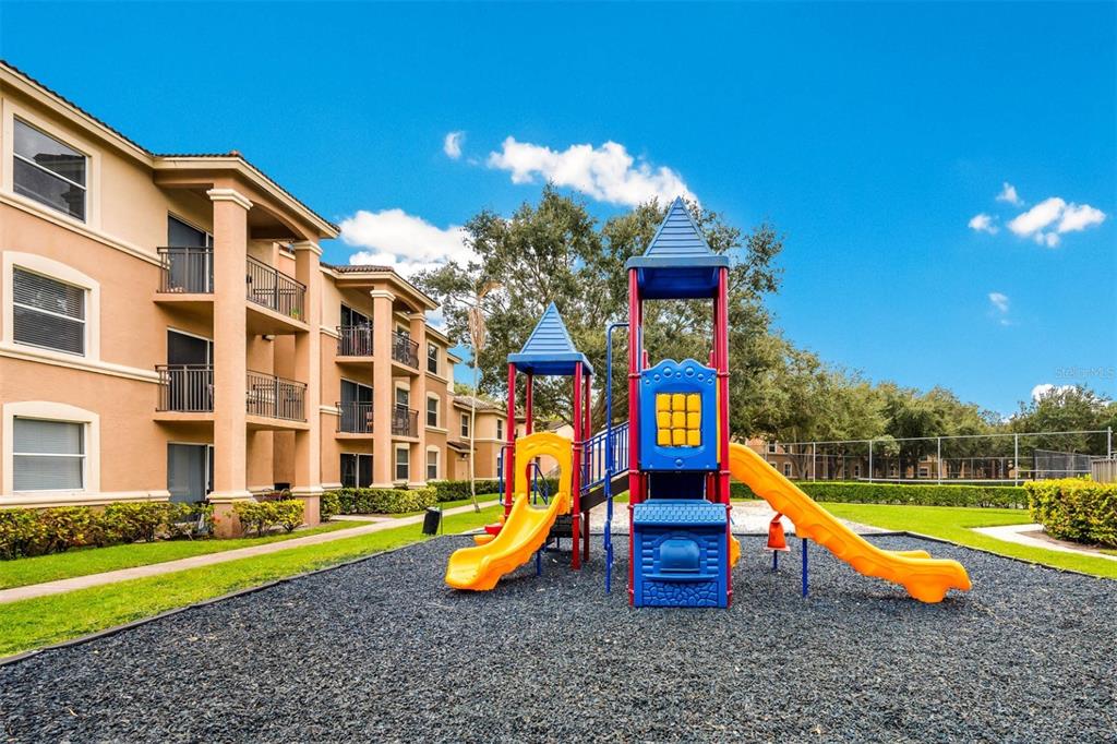 10101 Southwest 14th Street, Unit 3B10108 Pembroke Pines, FL 33025 - Photo 3 of 48 a view of a house with a park