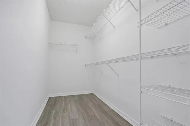 a view of a room with racks on the wall