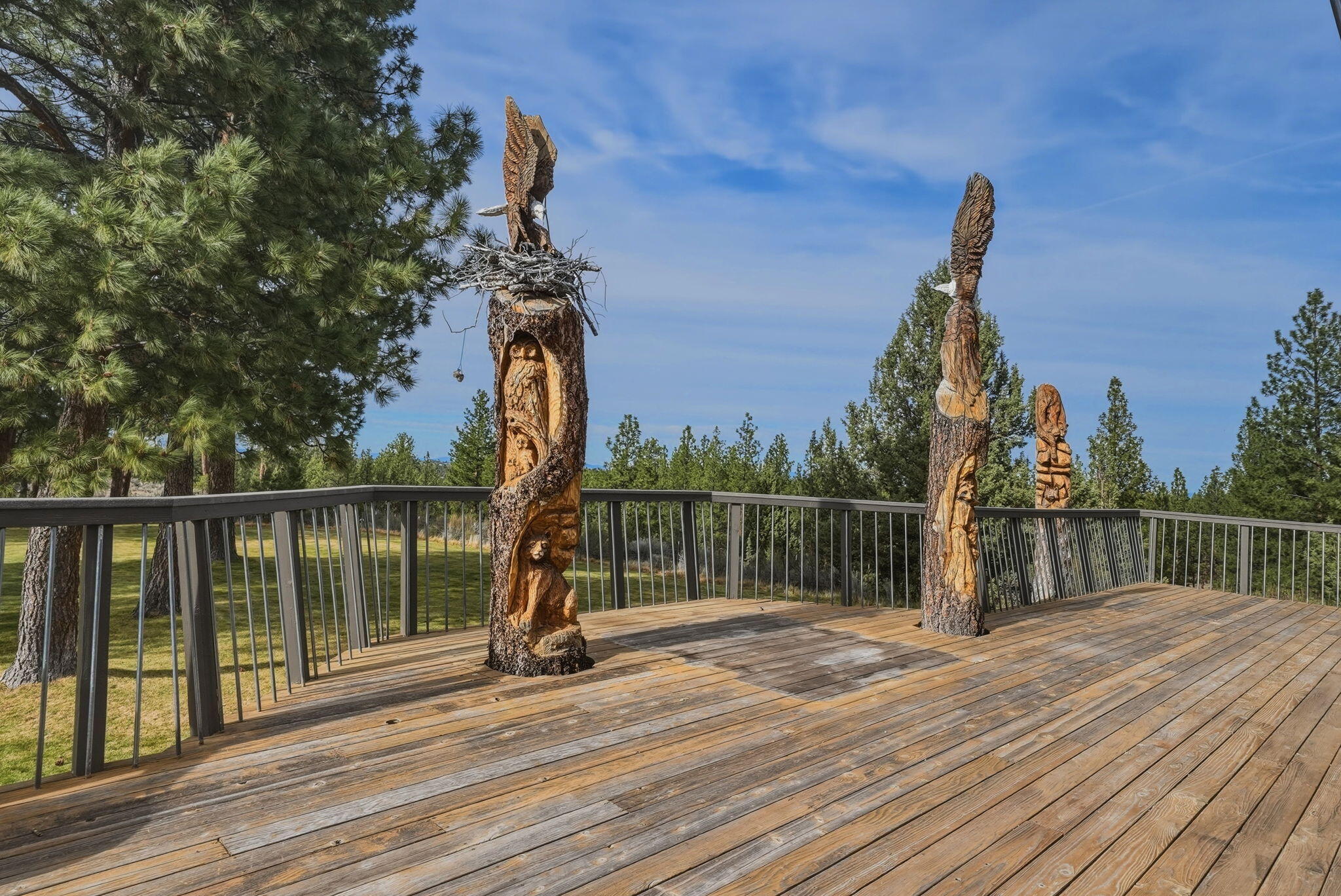 21680 Butte Ranch Road Bend, OR 97702 - Photo 54 of 65 CUSTOM CARVED TODEMS