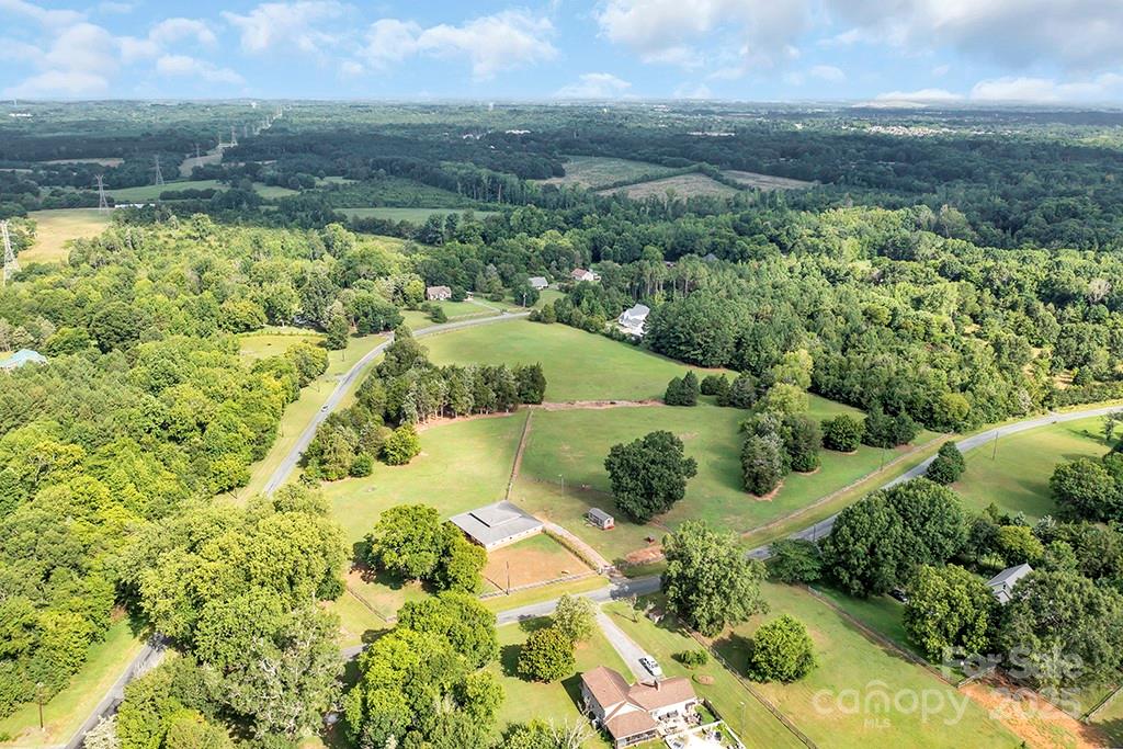 1900 Monterosa Road Concord, NC 28025 - Photo 14 of 46 a view of a lake with a mountain in the background