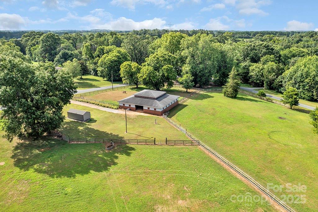 1900 Monterosa Road Concord, NC 28025 - Photo 18 of 46 a view of a big yard with table and chairs