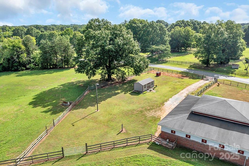 1900 Monterosa Road Concord, NC 28025 - Photo 20 of 46 a view of a swimming pool with a yard
