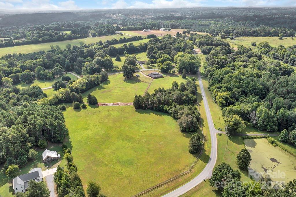 1900 Monterosa Road Concord, NC 28025 - Photo 2 of 46 an aerial view of residential houses with outdoor space