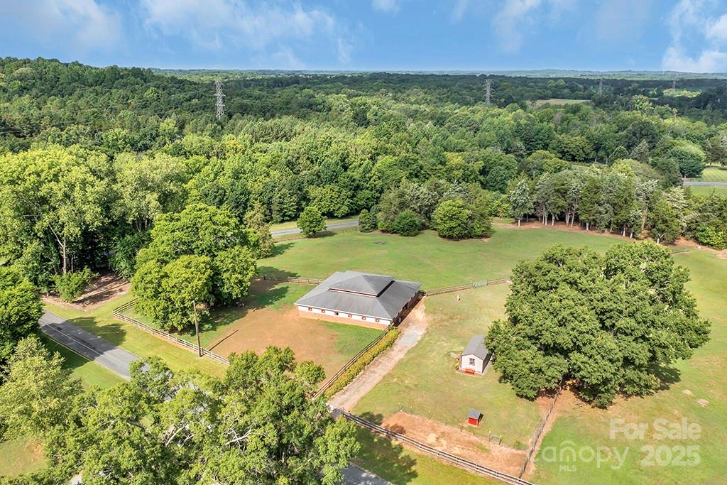 1900 Monterosa Road Concord, NC 28025 - Photo 23 of 46 a view of a lush green outdoor space with a lake view