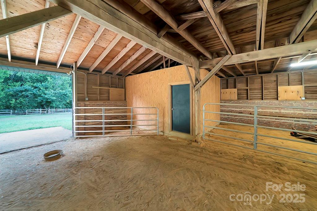 1900 Monterosa Road Concord, NC 28025 - Photo 28 of 46 a view of an empty room with a garage