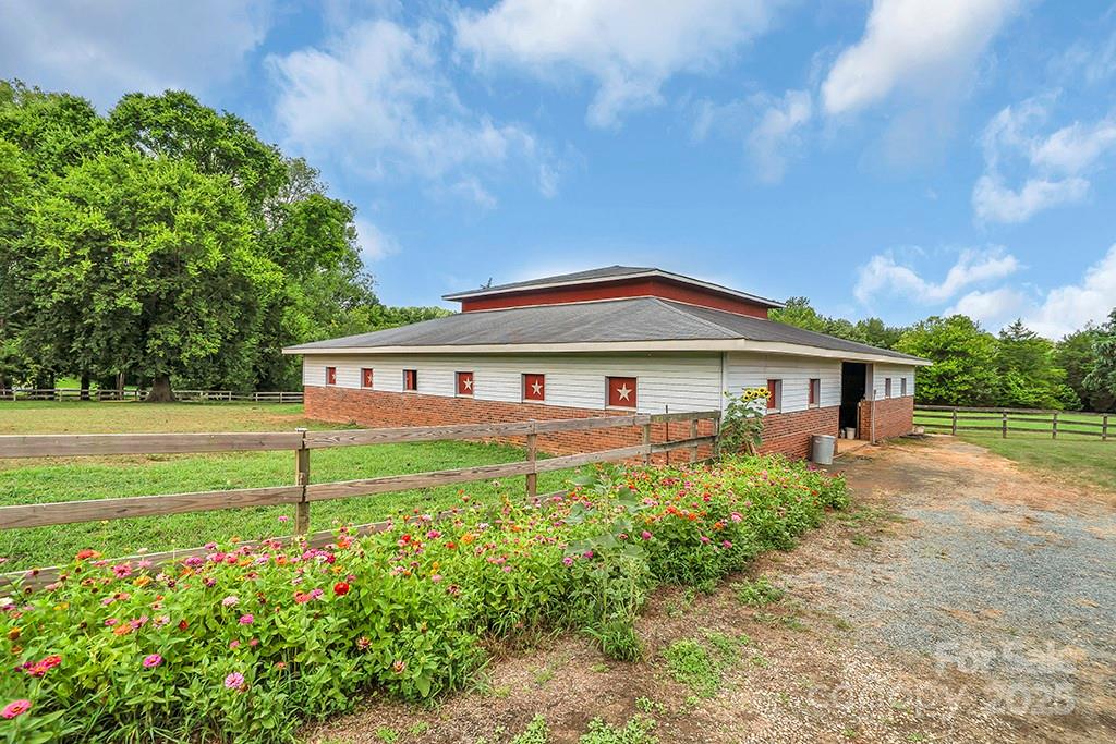 1900 Monterosa Road Concord, NC 28025 - Photo 42 of 46 a view of a house with a yard