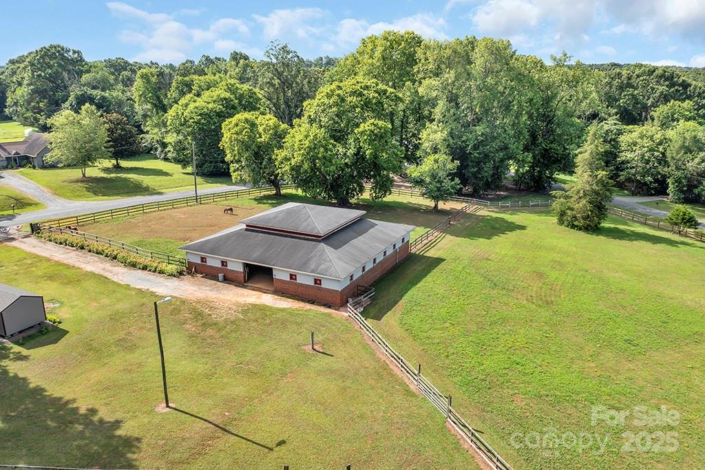 1900 Monterosa Road Concord, NC 28025 - Photo 6 of 46 a view of a backyard with swimming pool