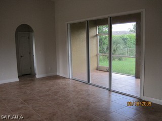 8342 Cardinal Road Fort Myers, FL 33967 - Photo 4 of 7 a view of empty room with window