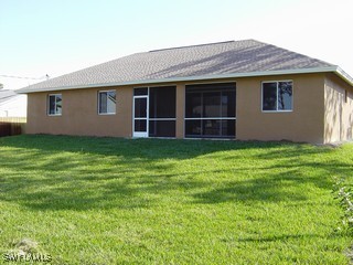 8342 Cardinal Road Fort Myers, FL 33967 - Photo 7 of 7 a house view with a garden space