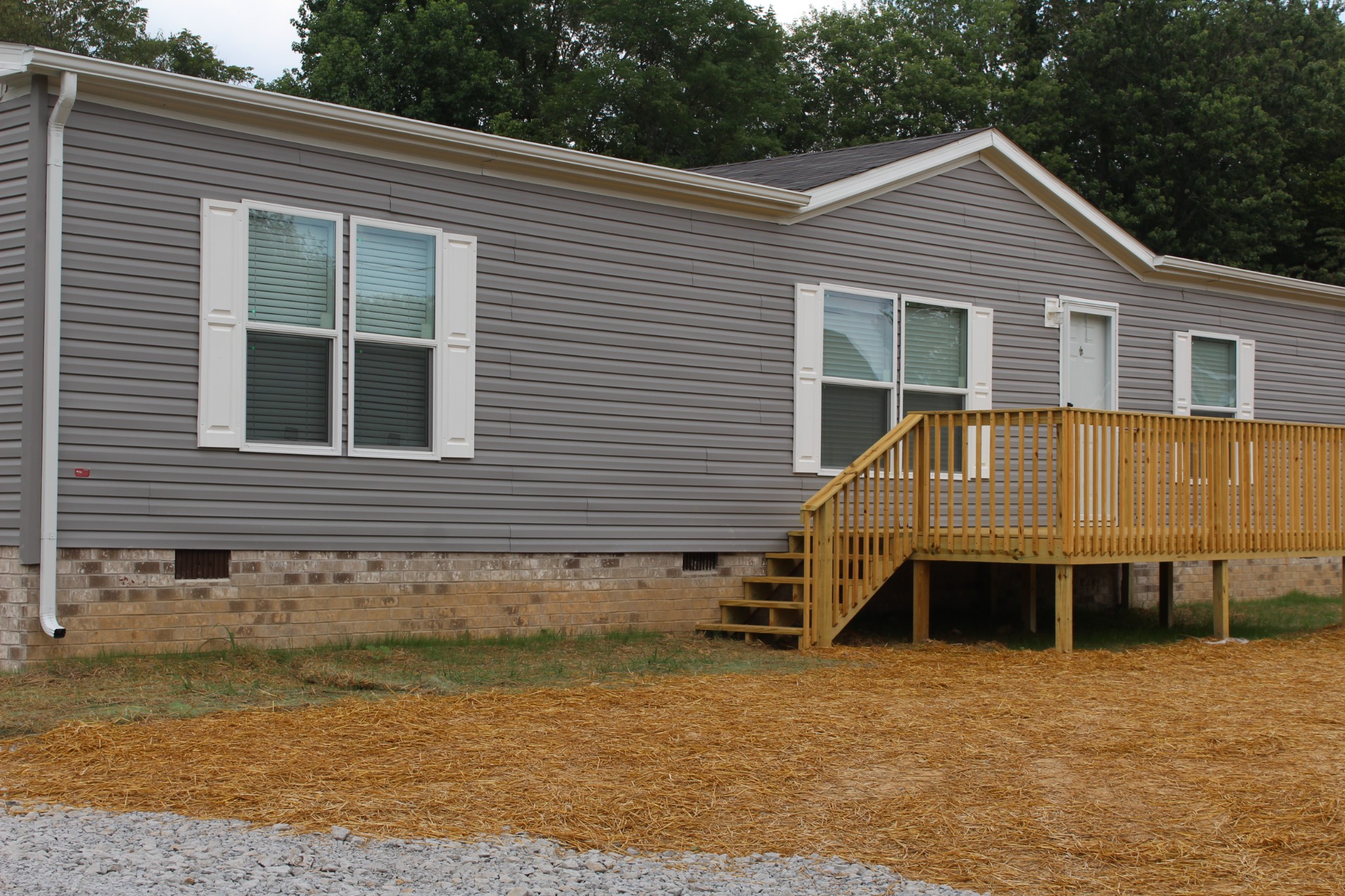 595 Days Road Lafayette, TN 37083 - Photo 1 of 21 a front view of a house with a yard