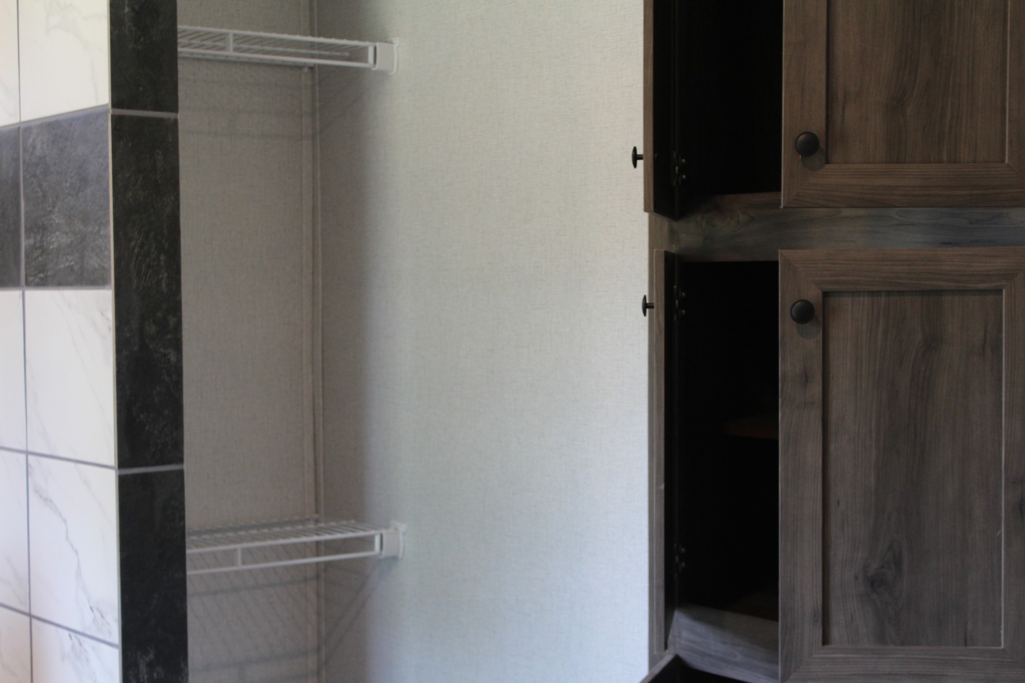 595 Days Road Lafayette, TN 37083 - Photo 12 of 21 a view of walk in closet with empty racks