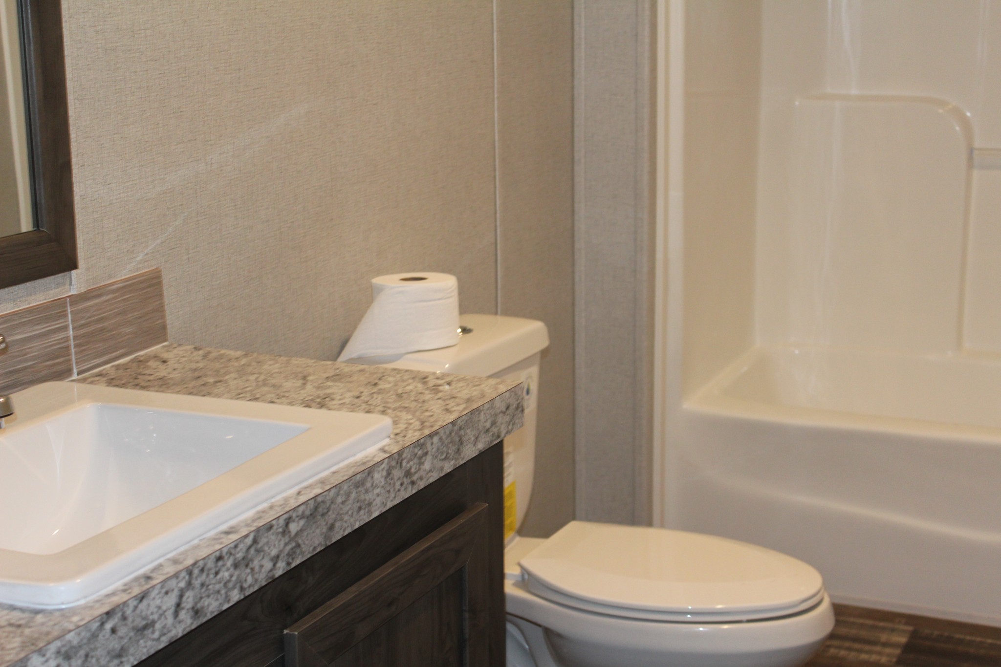595 Days Road Lafayette, TN 37083 - Photo 13 of 21 a bathroom with a granite countertop sink toilet and bathtub