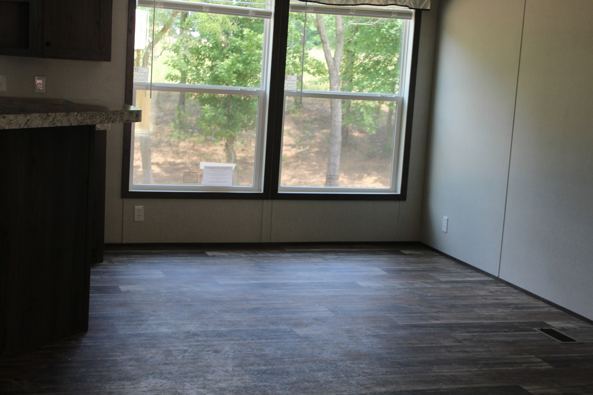 595 Days Road Lafayette, TN 37083 - Photo 16 of 21 a view of an empty room with wooden floor and a window