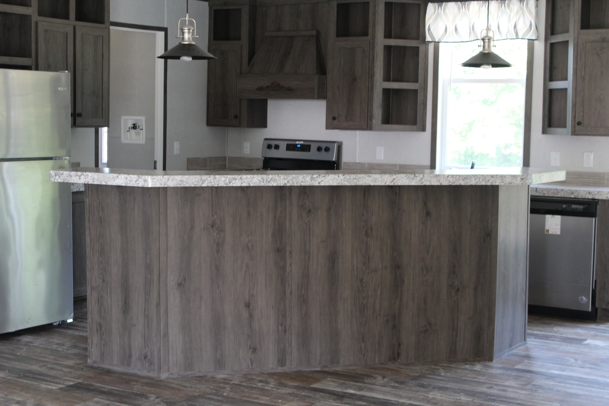 595 Days Road Lafayette, TN 37083 - Photo 17 of 21 a kitchen with granite countertop a refrigerator and a sink