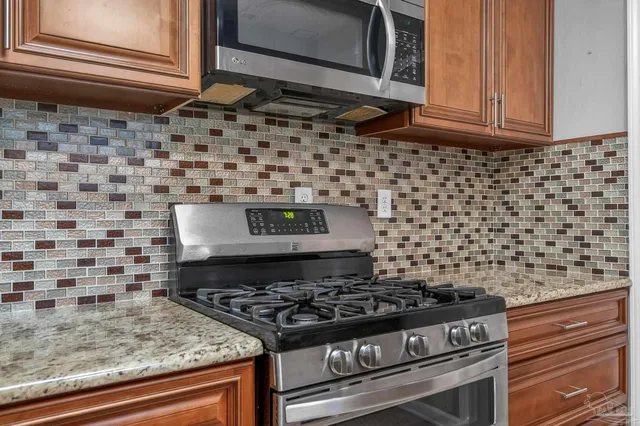 a kitchen with a sink and a window