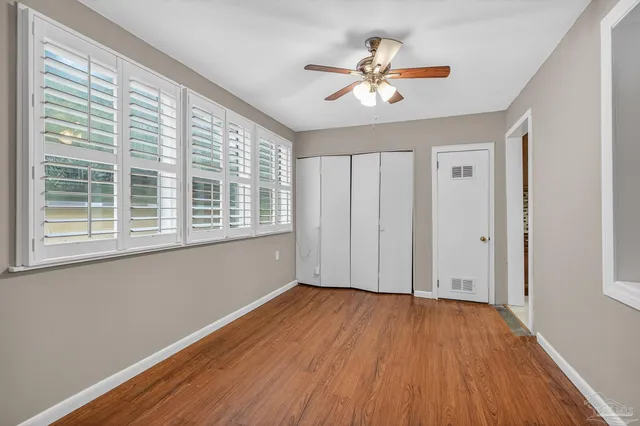 a kitchen with stainless steel appliances granite countertop a stove and a microwave