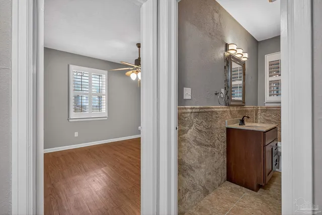 a bathroom with bathtub and shower