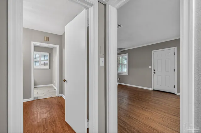 a view of an empty room with a window