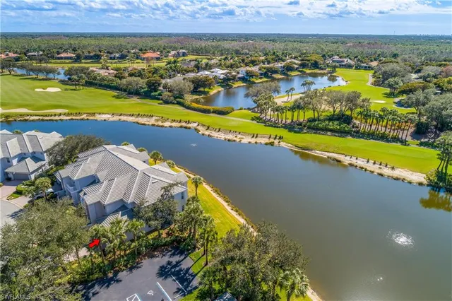 a view of a city with swimming pool and mountains