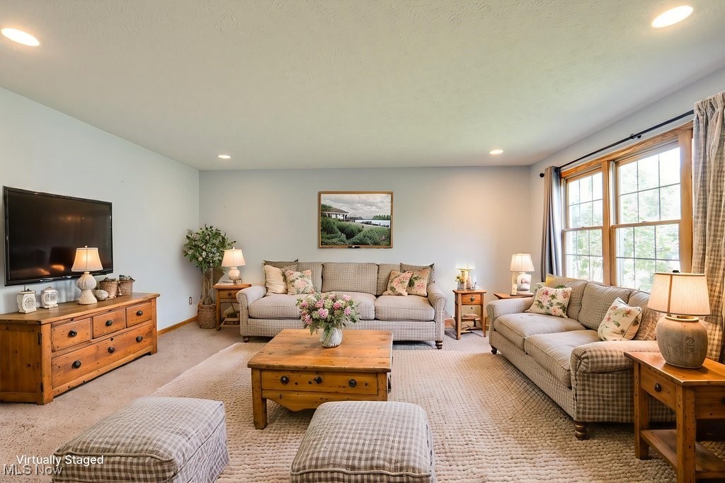 5613 Stoney Ridge Road Northwest Canton, OH 44718 - Photo 6 of 39 Living area with recessed lighting and carpet