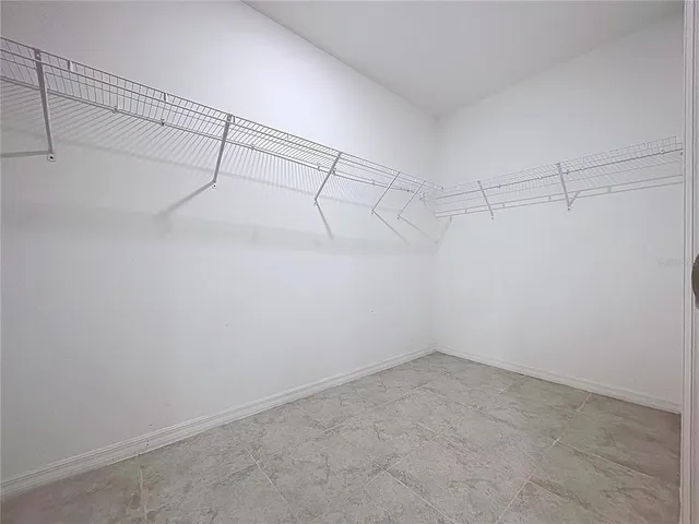 a bathroom with a toilet and a bathtub