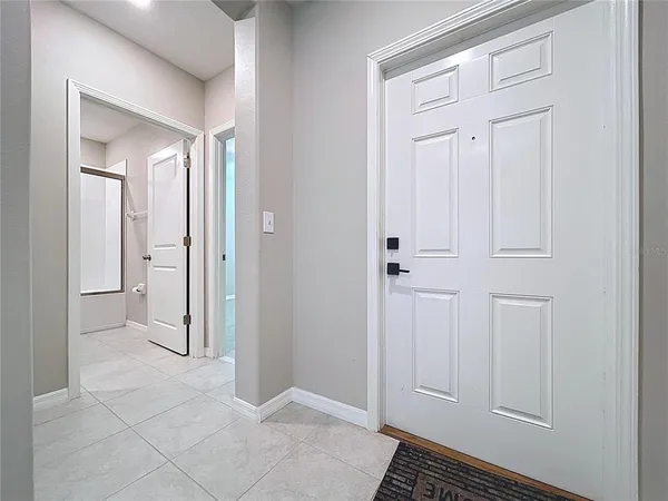 a bathroom with a toilet and a bathtub