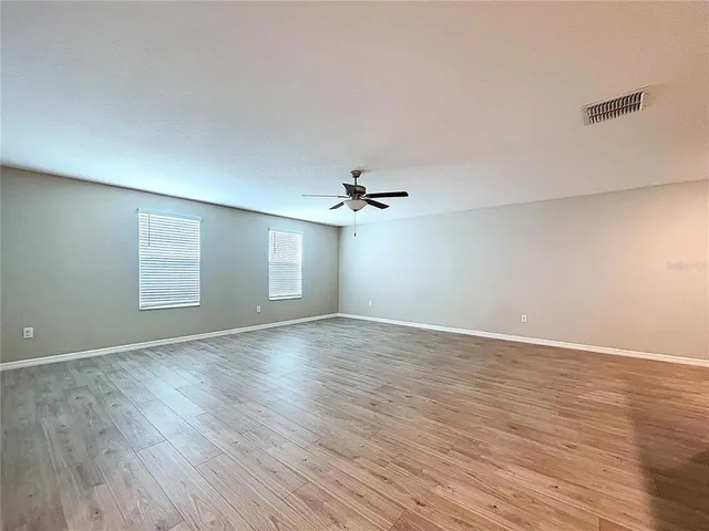 an aerial view of house with yard swimming pool and outdoor seating