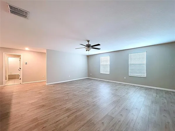 an aerial view of house with yard swimming pool and outdoor seating