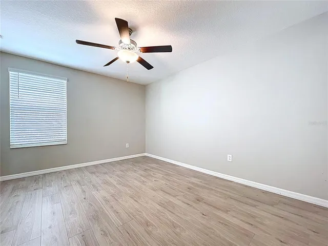 an aerial view of a house with a garden