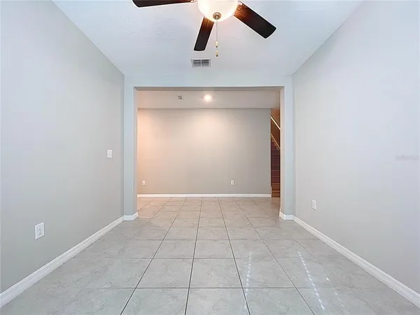 a large kitchen with stainless steel appliances granite countertop a sink and cabinets