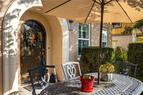 a dining room with a table and chairs