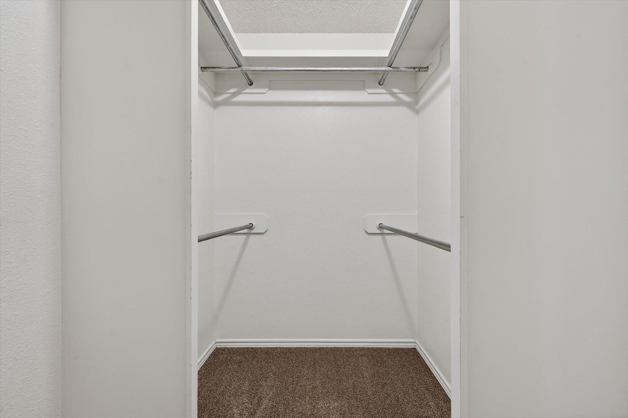 2216 97th Street Lubbock, TX 79423 - Photo 26 of 29 a view of walk in closet