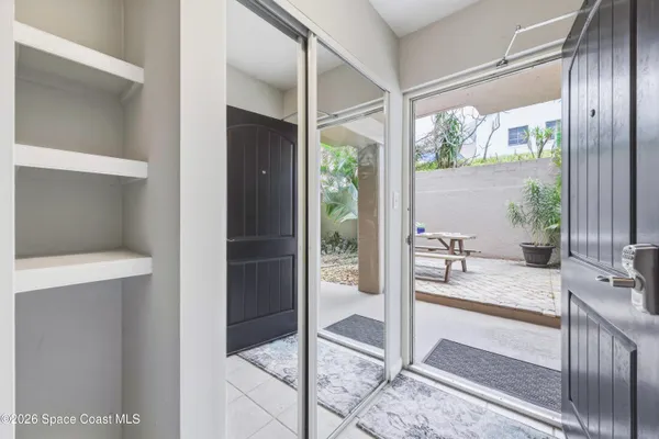 a bathroom with a toilet and a bathtub
