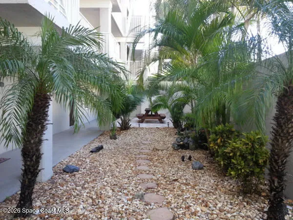 a bathroom with sinks and a mirror